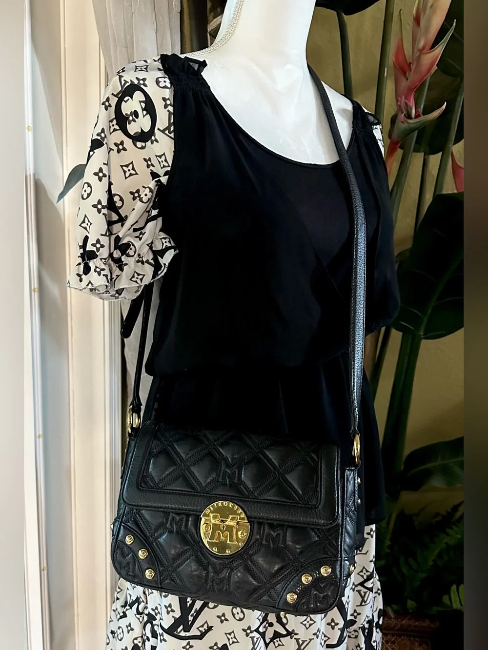 Metrocity Black Quilted Leather Crossbody Bag with Gold Hardware
